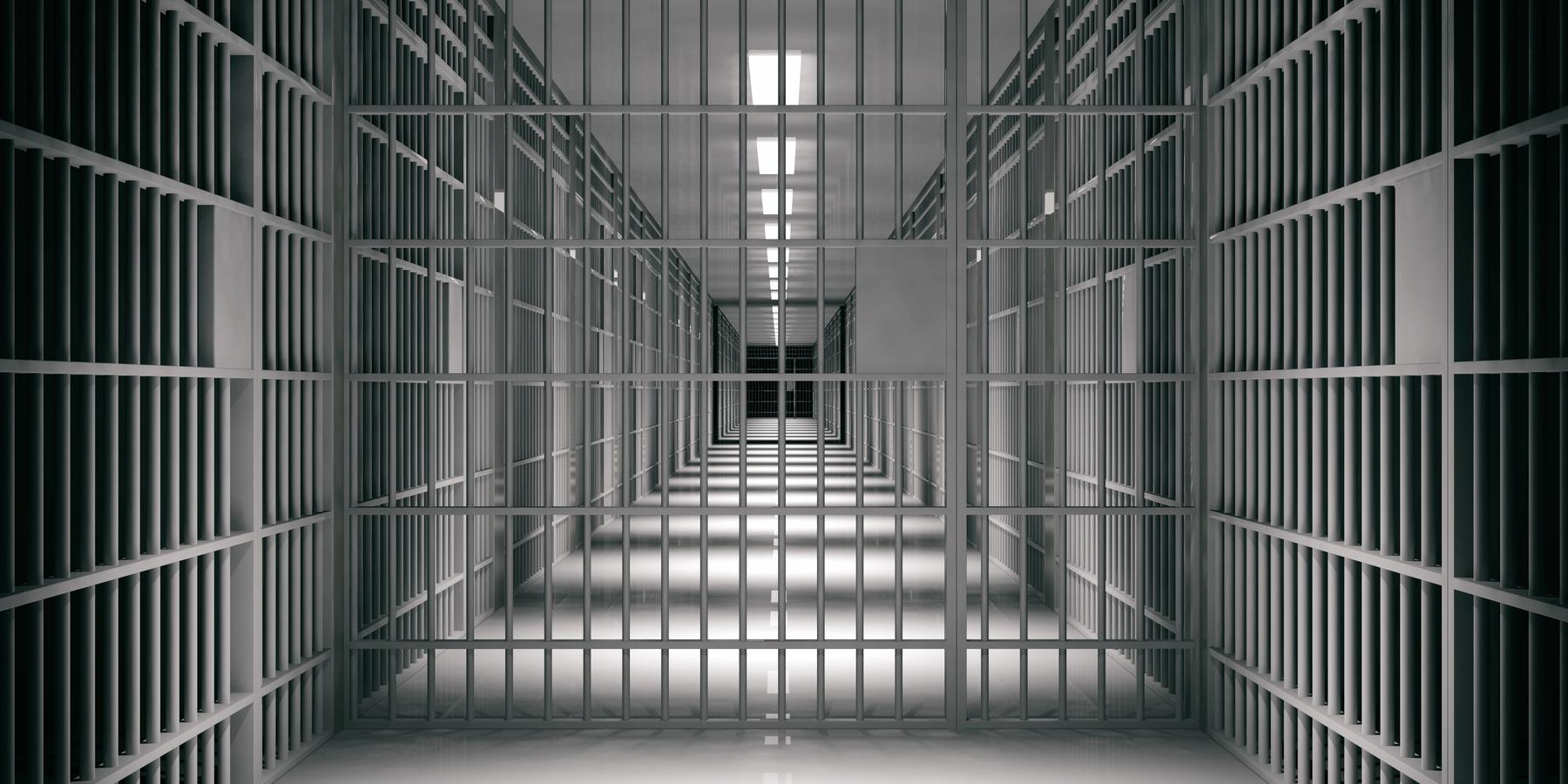 A corridor of prison cells